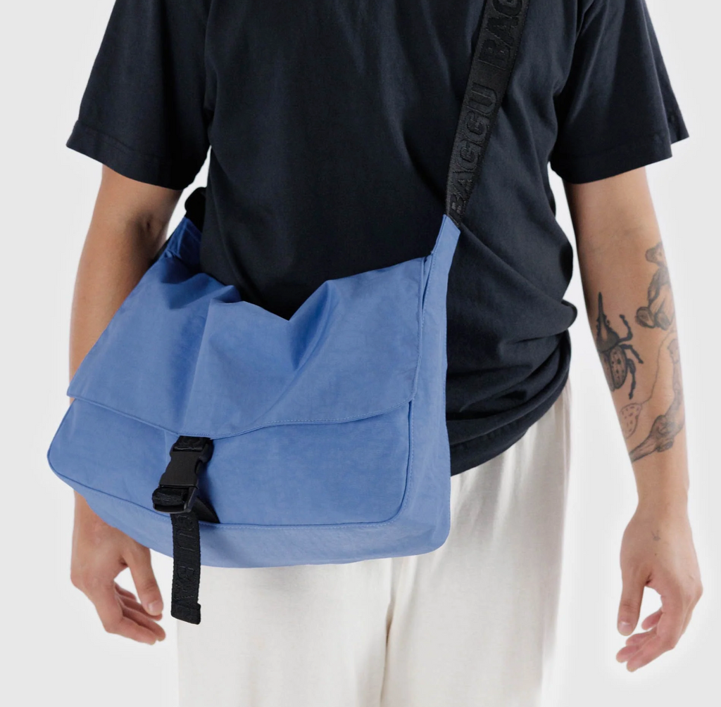Pansy Blue Nylon Messenger bag beong worn cross body.