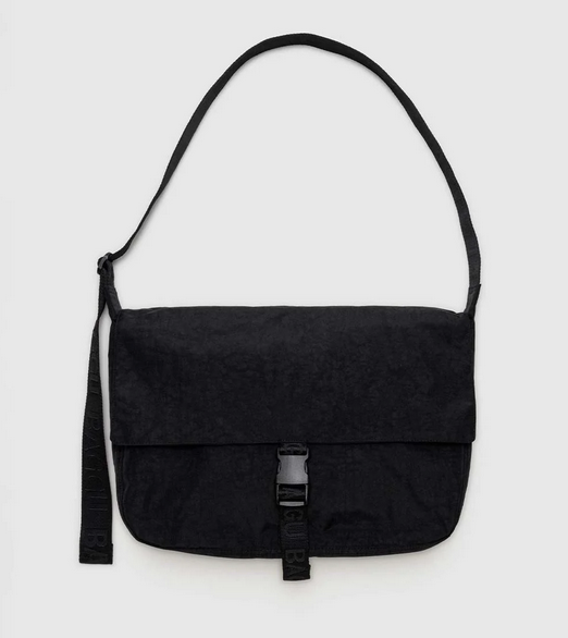 Baggu Nylon Black Messenger Bag with black shoulder strap and closure.