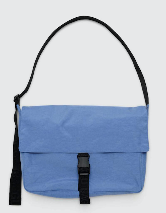 Pansy Blue Baggu Nylon Messenger bag with black shoiulder strap and closure.