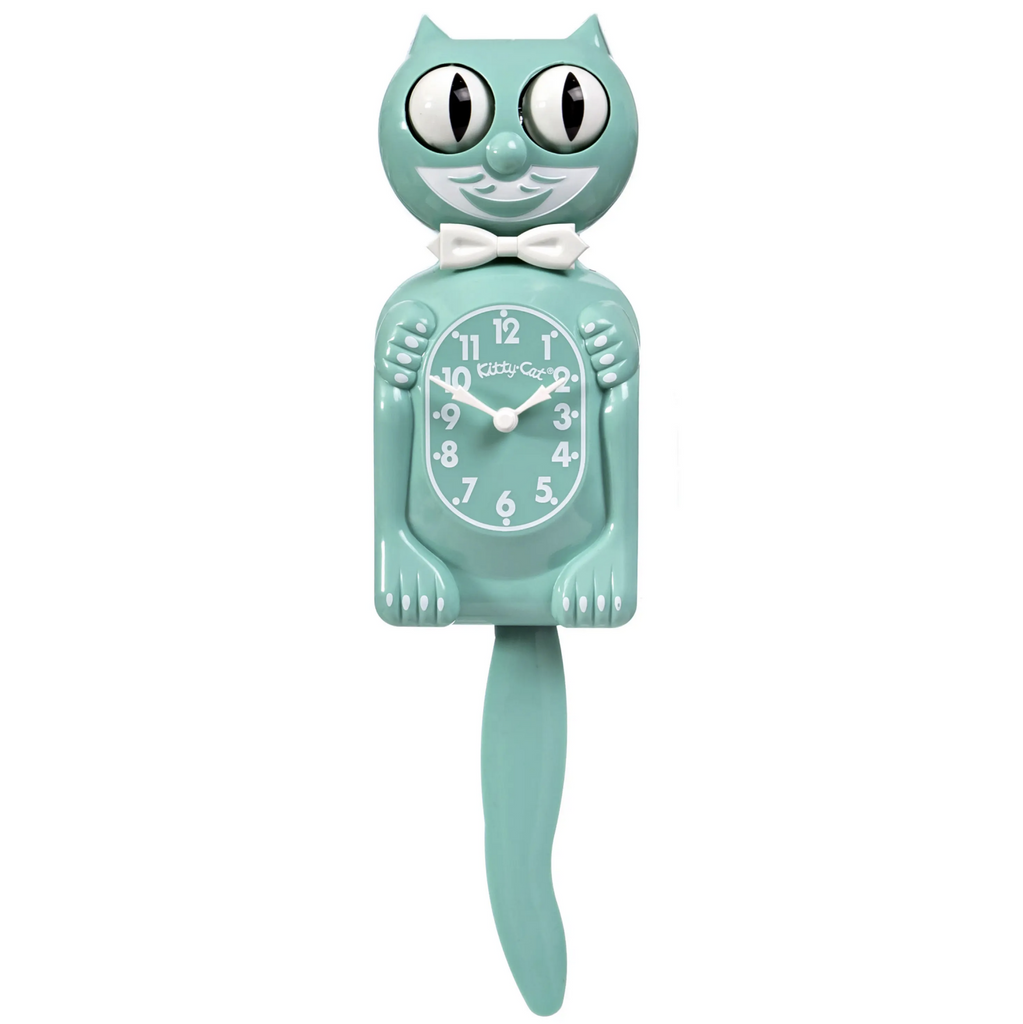 Blue green colored Kit Cat clock with white bowtie, moving eyes and wagging tail. Just a bit smaller than the original. 
