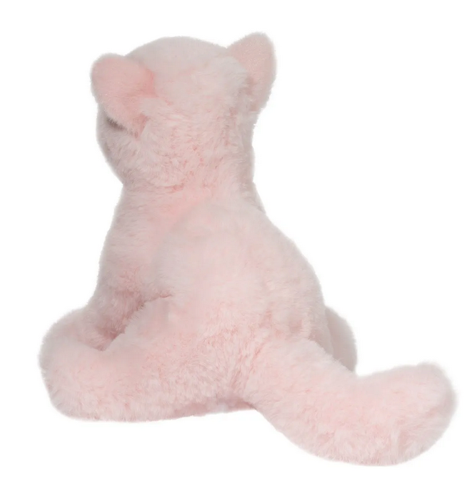 Back view of Cadie the Pink cat with her tail stretched out behind her 