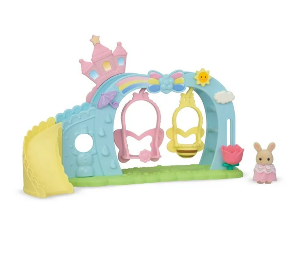 The Calico Critters Nursery Swing with the included Milk Rabbit baby standiong beside the swing. 