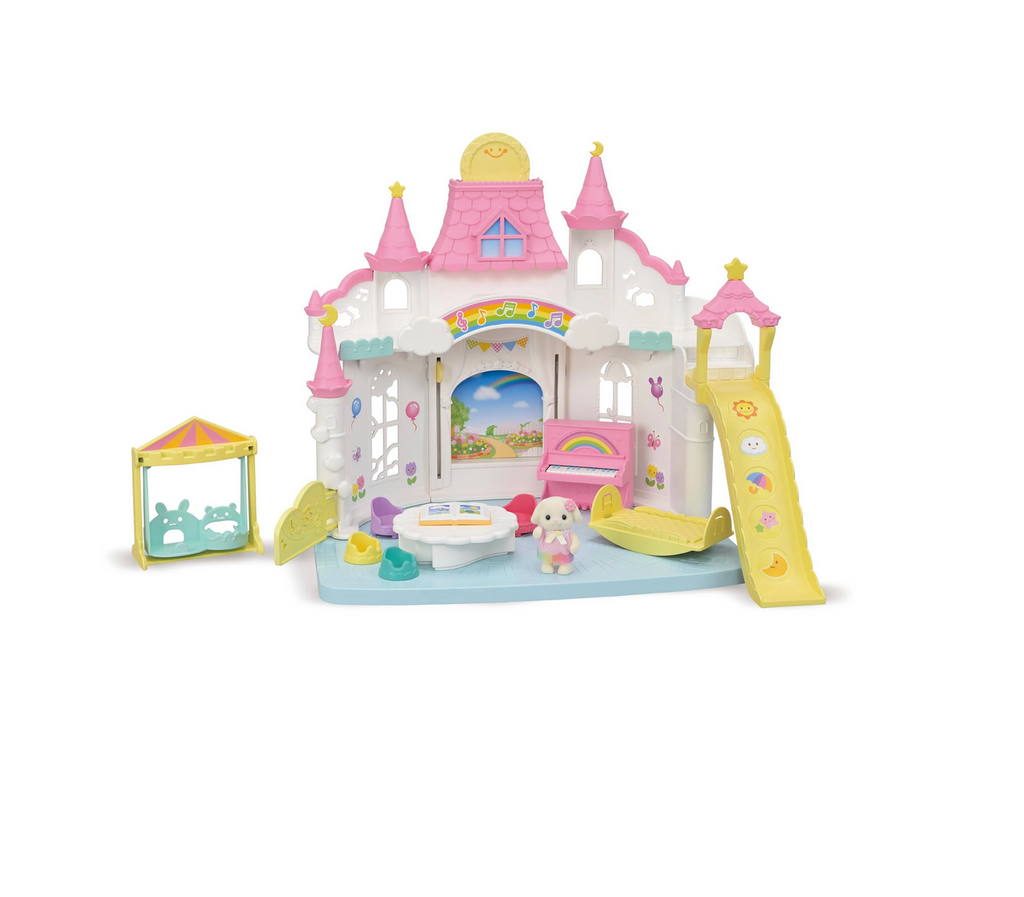 The Sunny Castle Nursery with a yellow slide and pink piano with pink turrets and roof tiles. 