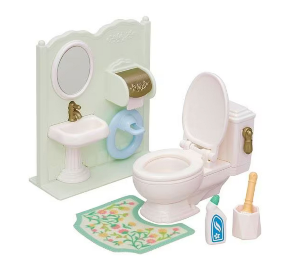 The Calico Critters Toilet Set with a toilet, rug, toillet brush and cleaner, wall with a sink, mirror, toilet paper roll and toddler potty seat.