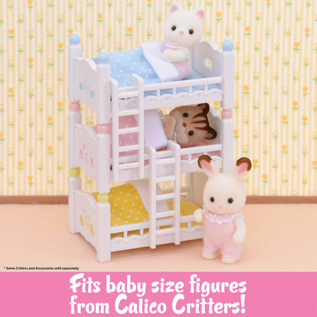 Picture of the Calico Critters Triple Baby Bunk Beds stacked three high with babies laying them.