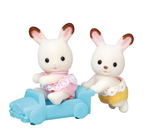 Calico Critters Chocolate Rabbit Twins with sister sitting in the toy car and brother pushing her.