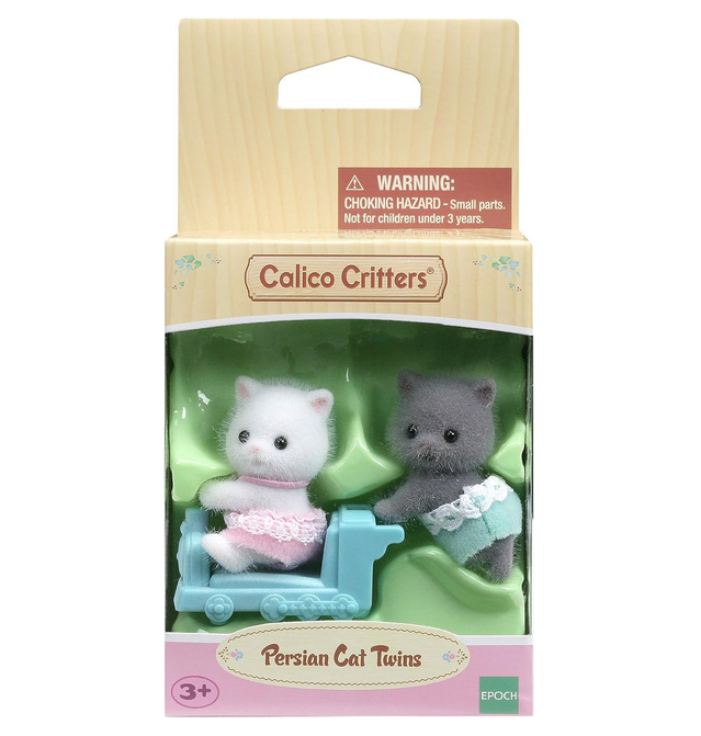Box with clear plastic window showing the Persian Cat Twins with their ride on toy.