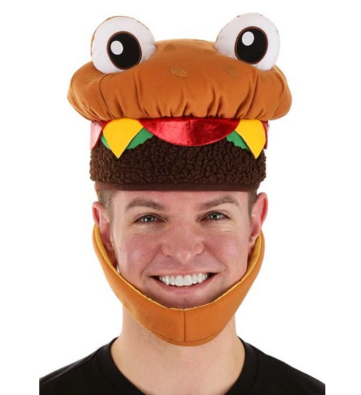 The Cheeseburger Jawsome Hat. The hat band is styled to look like a juicy burger patty, complete with lettuce, cheese, and tomato toppings. The neck band is designed to resemble the bottom half of a bun, while the stuffed crown of the hat represents the top half. Shown here being worn by an adult. 