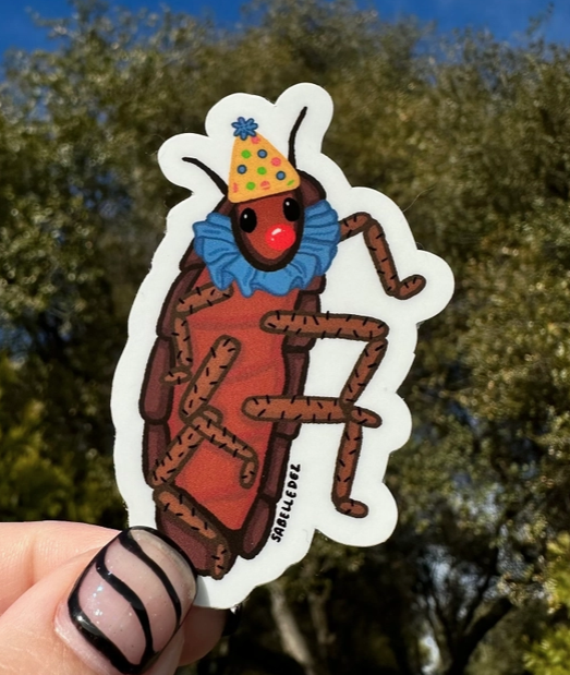 Vinyl sticker of a cartoon roach with a red clown nose, clown hat and collar.
