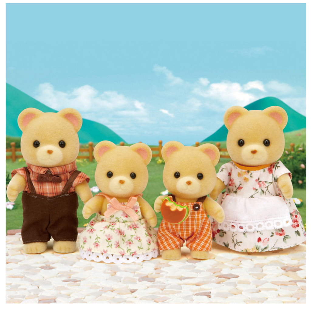 Mother, father, and twin Calico Critters Cuddle Bear family figures in front of a meadow backdrop.