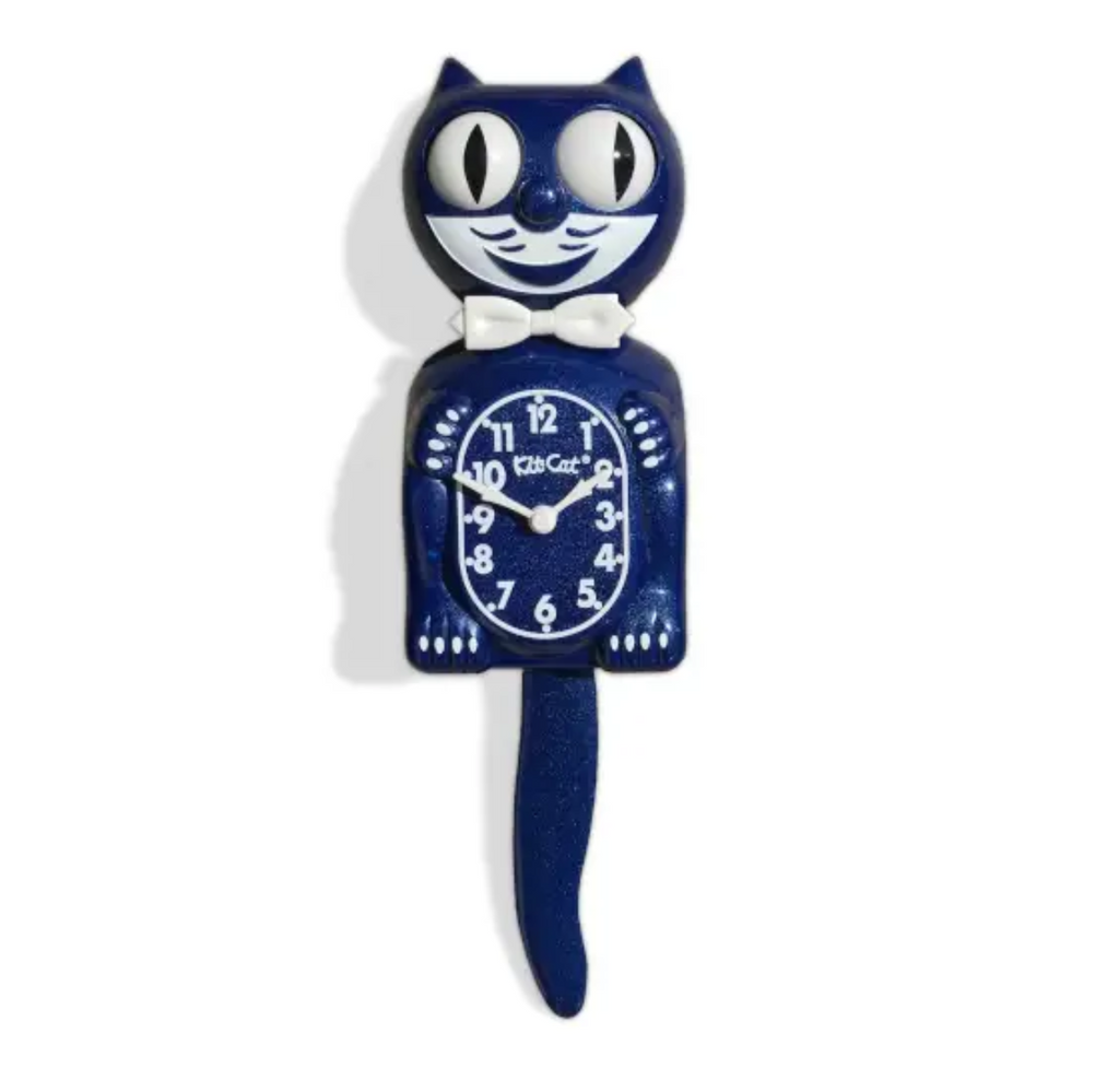 Kit Cat wall clock with signature moving eyes and tail. Colored in a deep blue with a glitter shine finish. 