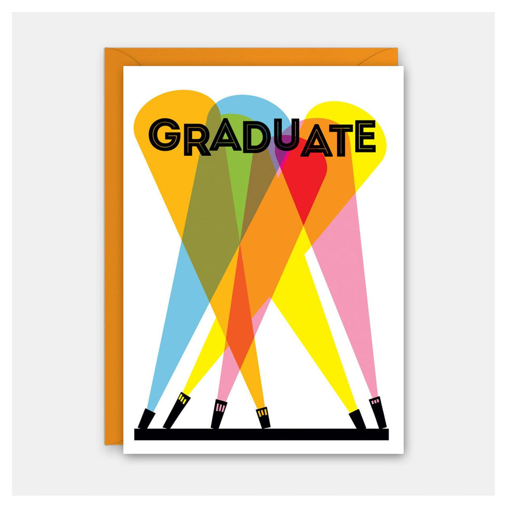 Greeting card with white background and spotlights shining bright colors onto the word Graduate.