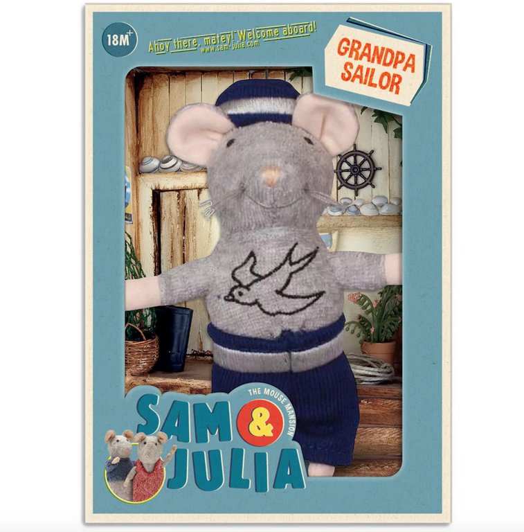 Plush Grandpa Sailor mouse with the bird tattoo on his chest in an open box.