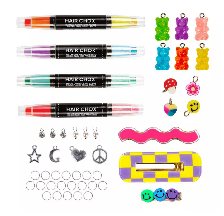 All four hair chox pens, each of the hair charms and three barrettes that come with the kit. 