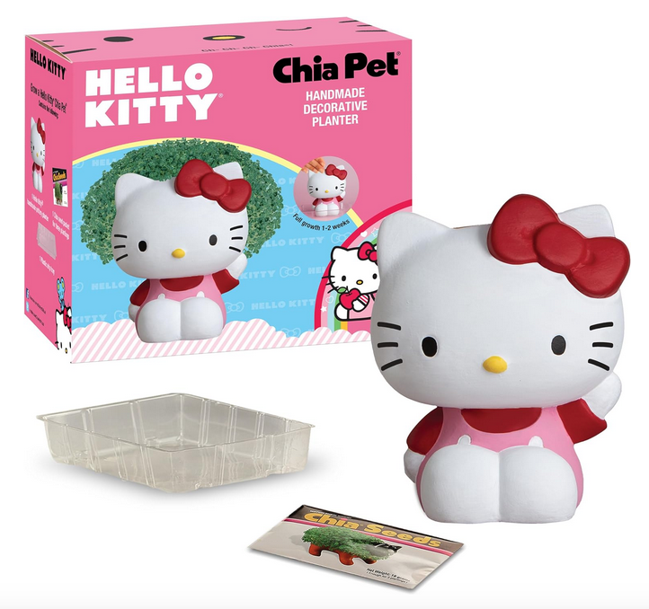 Hello Kitty Chia Pet box with ceramic Hello Kitty planter, seed packet and drip tray in  the foreground.