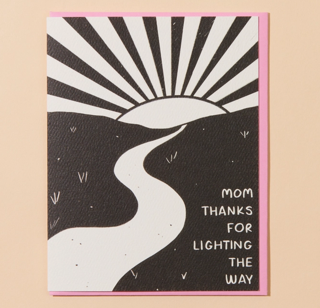Greeting card with illustartion of a road leading to the sun coming up over the horizon.