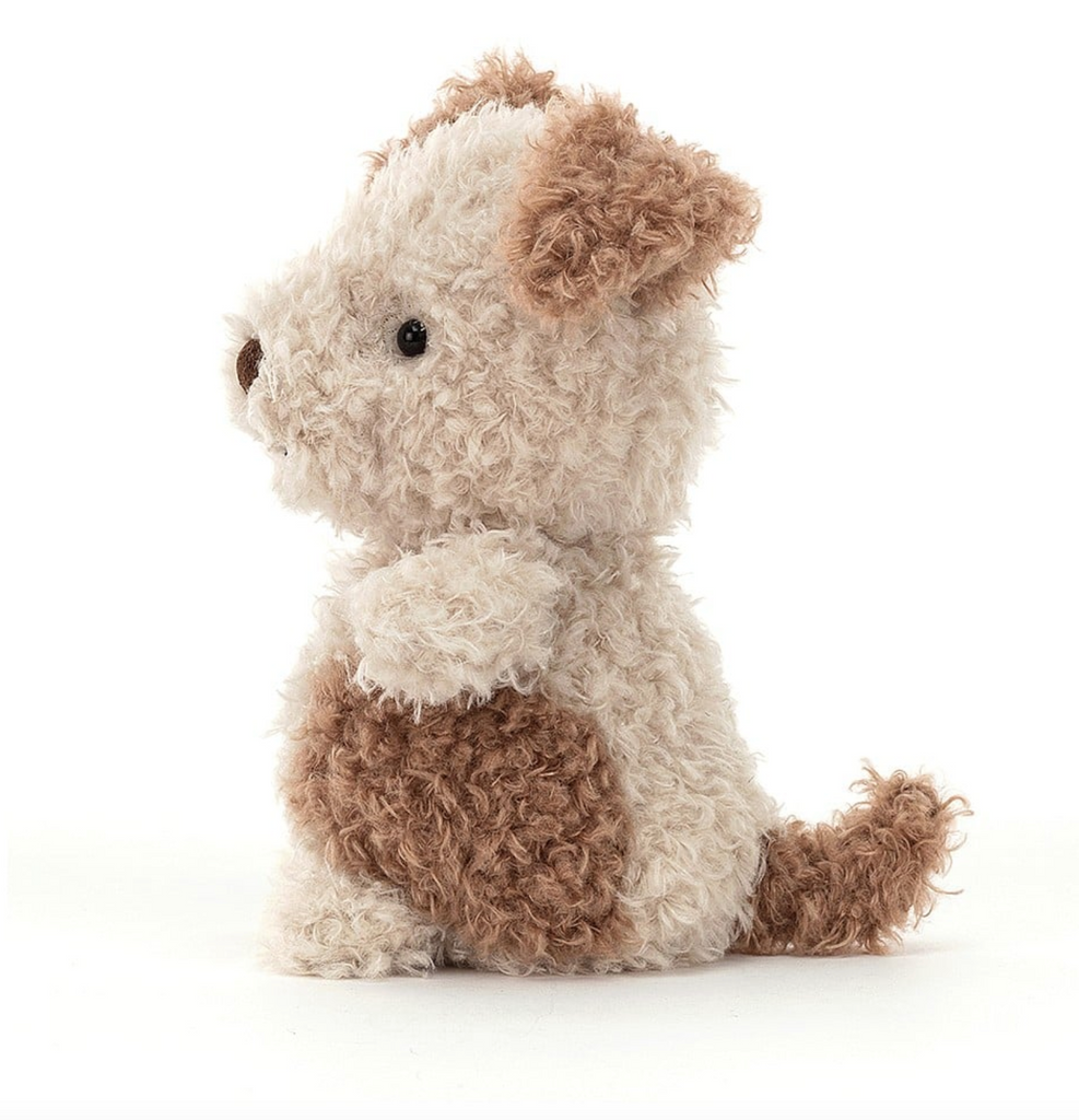 Plush Little Pup viewed from the side with his pudgy little puppy body and tail.