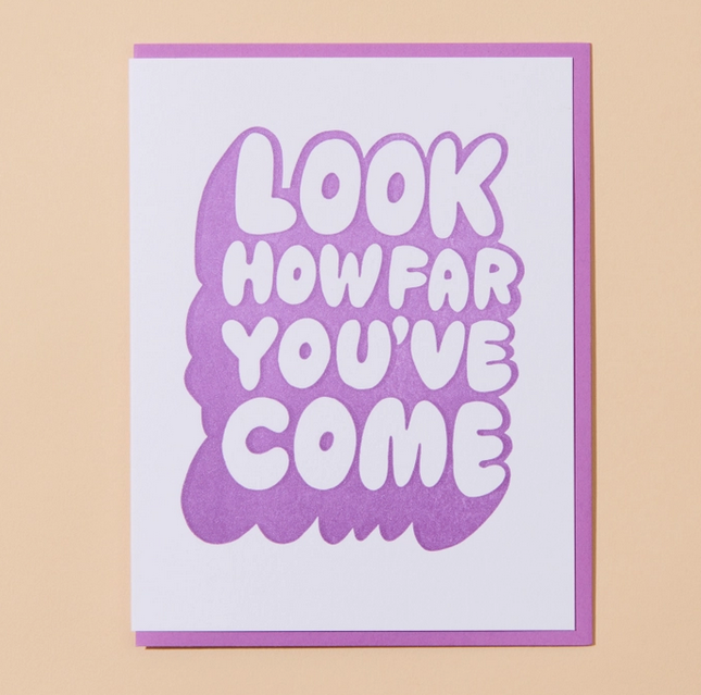 White background greeting card with purple bubble lettering that reads "Look How Far You've Come"