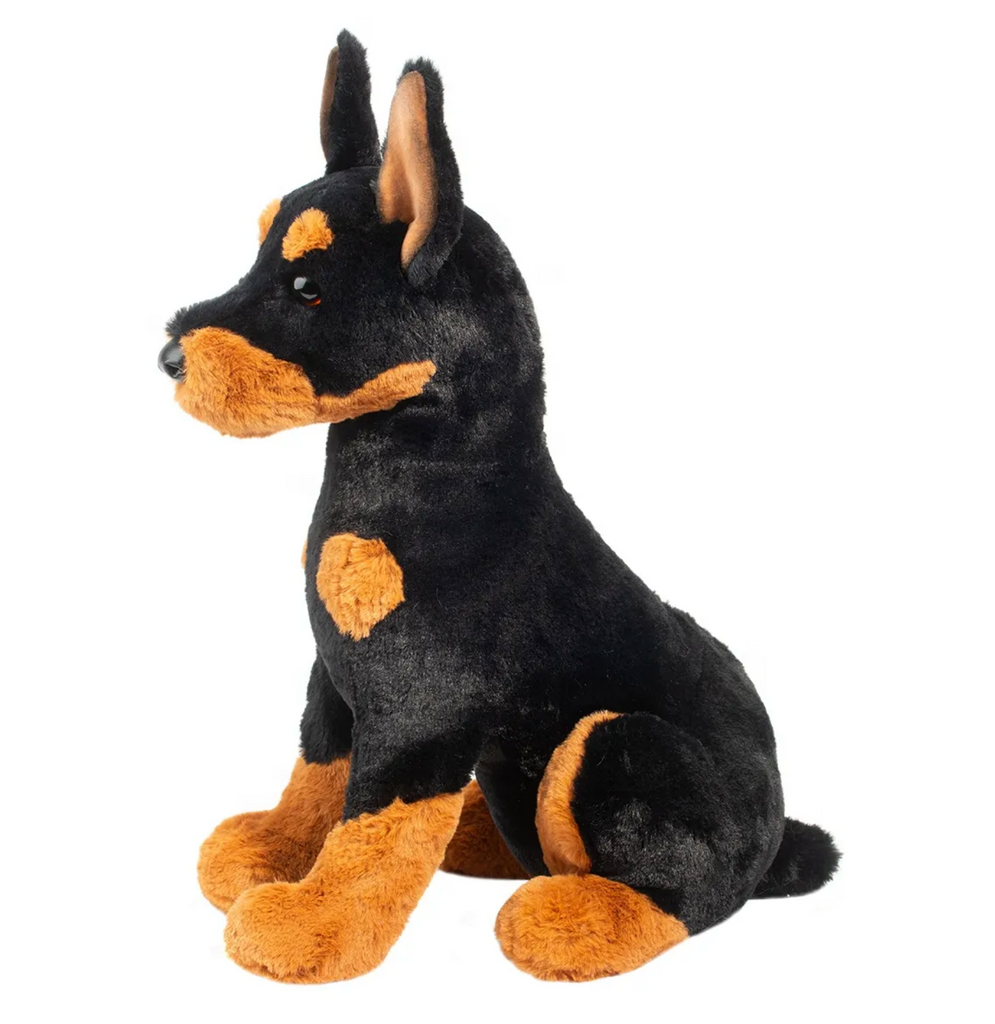 Black and tan plush Doberman dog viewed from the side.