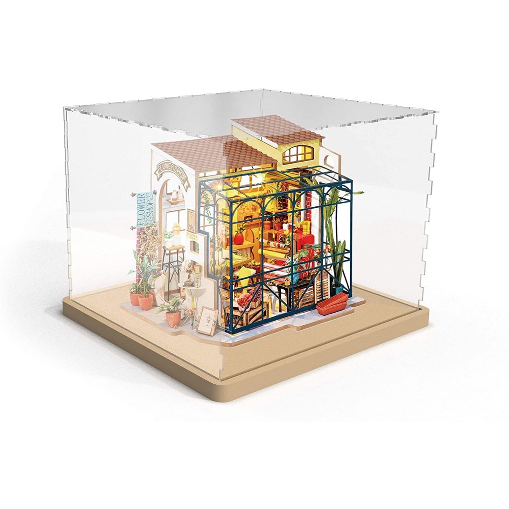 The clear acrylic dust cover with a built miniature green house inside. 