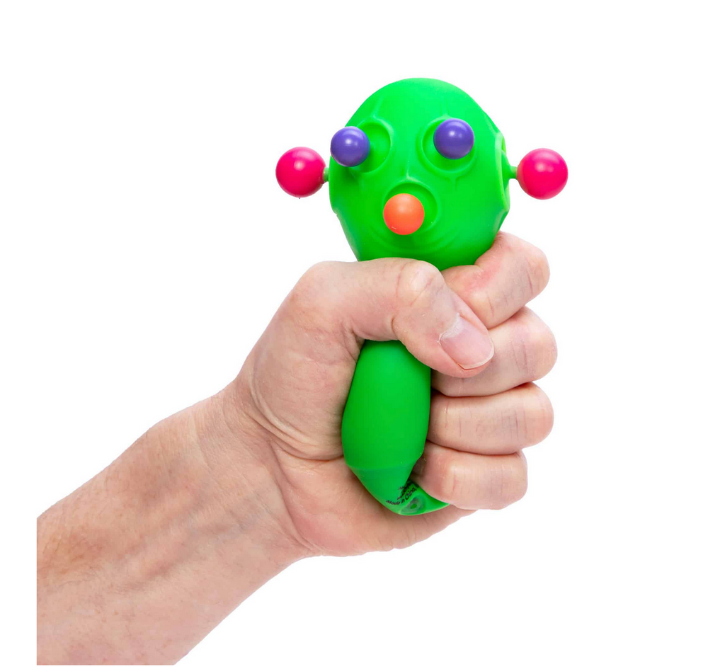 Hand squeezing green Panic Pete.