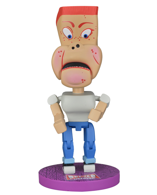 Randy puppet from Pee Wee's Playhouse bobble head figure on a purple stand.