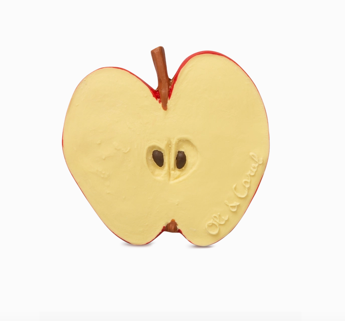 Pepita the Apple teether toy is a slice of an apple with the seeds and stem still intact. 