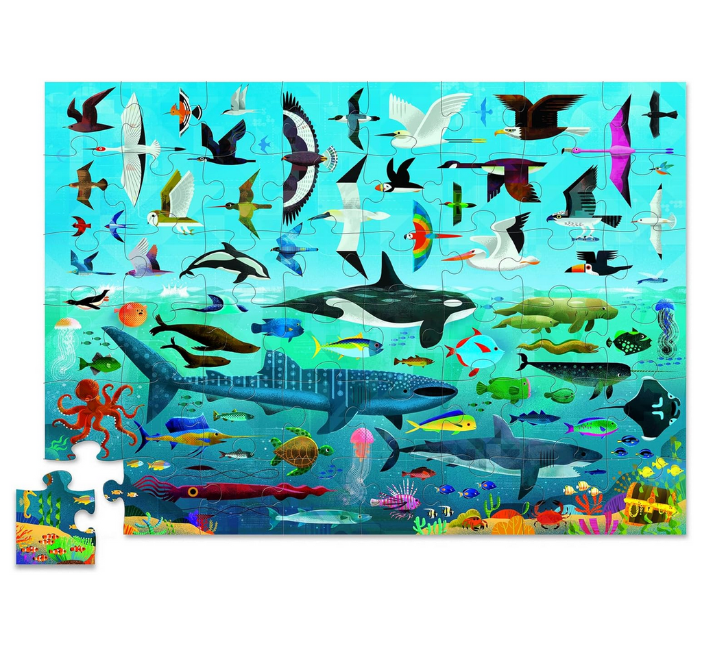 Completed Sea and Sky 48 piece puzzle with animals that live in the ocean and fly through the sky.
