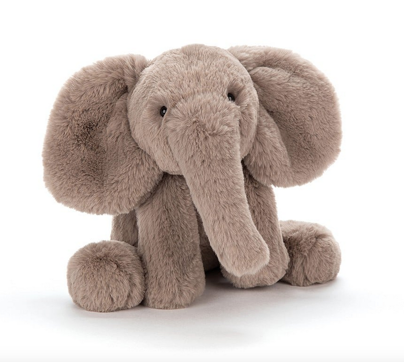 Sitting in an upright position the Smudge Elephant with it's giant ears and super soft fur. 