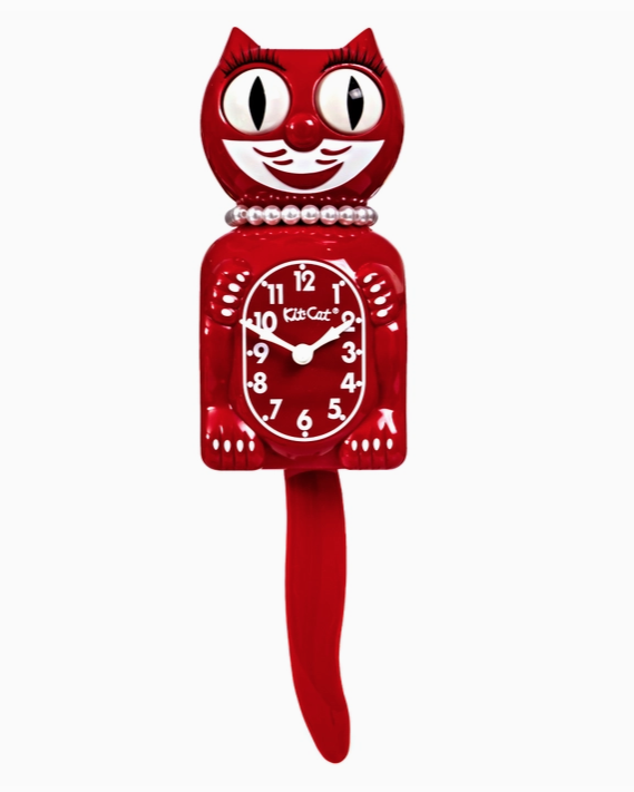 Classic Kit Cat Clock with pearls and eyelashes in Space Cherry Red.