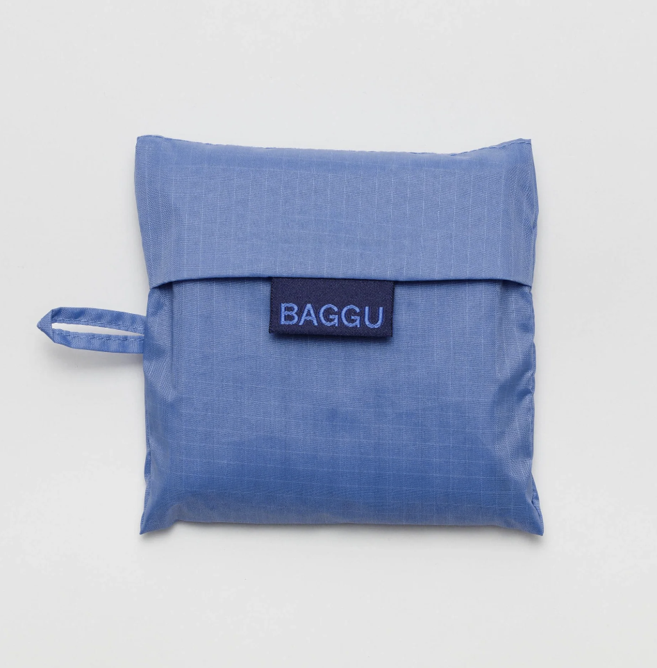 Pansy Blue nylon Baggu folded into it's carrying case.
