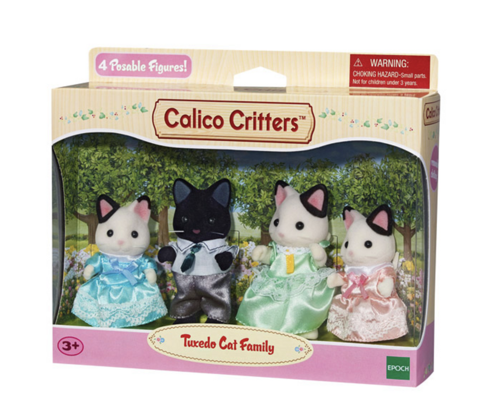 Tuxedo Cat Family Calico Critters figures in their display box.