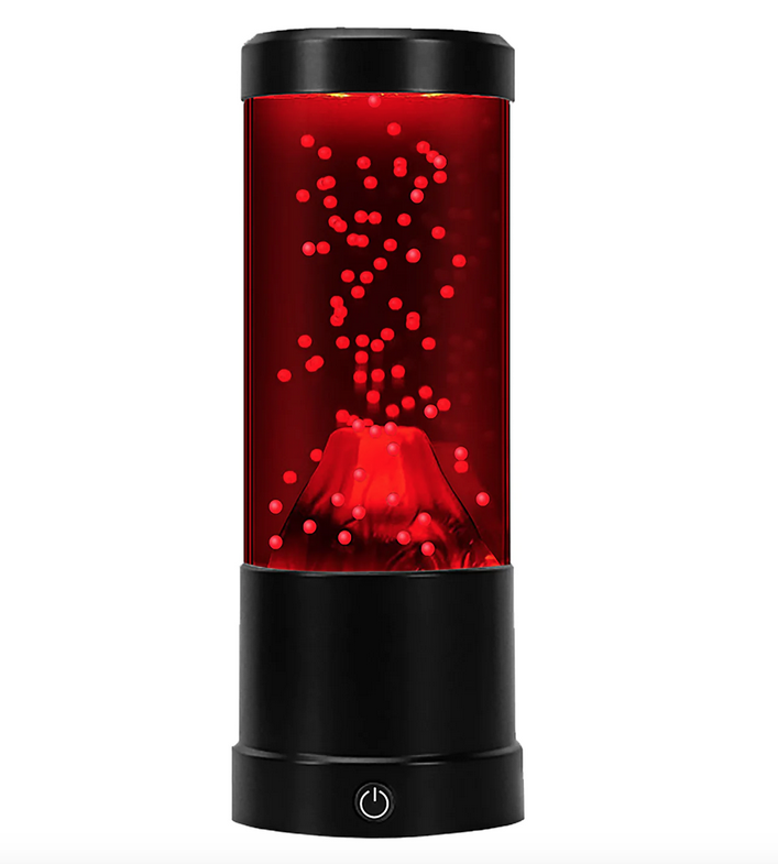 Tubular lamp with black base and red light with volcano spewing red beads.