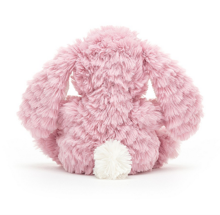 View of the back of the Yummy Bunny with purple pink fur and a bright white cottontail.  