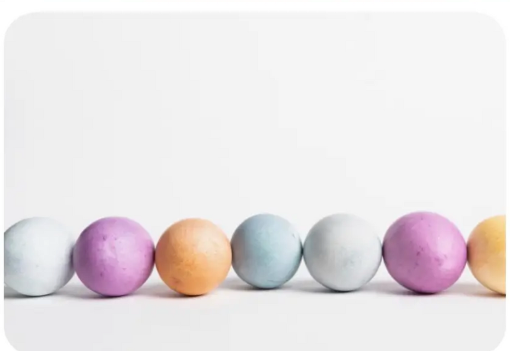 Eggs colored different colors.