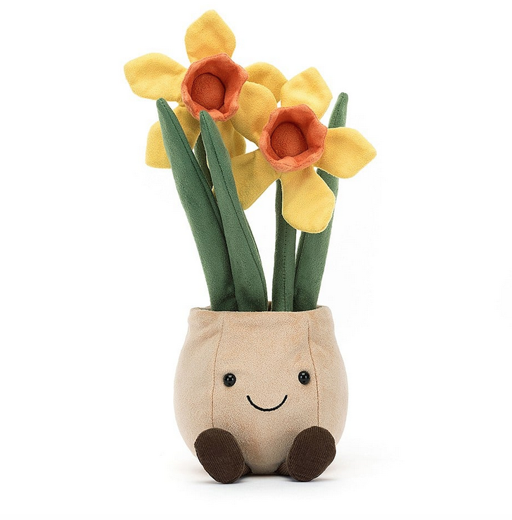 The Amuseable Daffodil Pot plush sitting upright and facing forward. The pot is a light tan with dark green leaves leading to yellow and gold blooming daffodils. 
