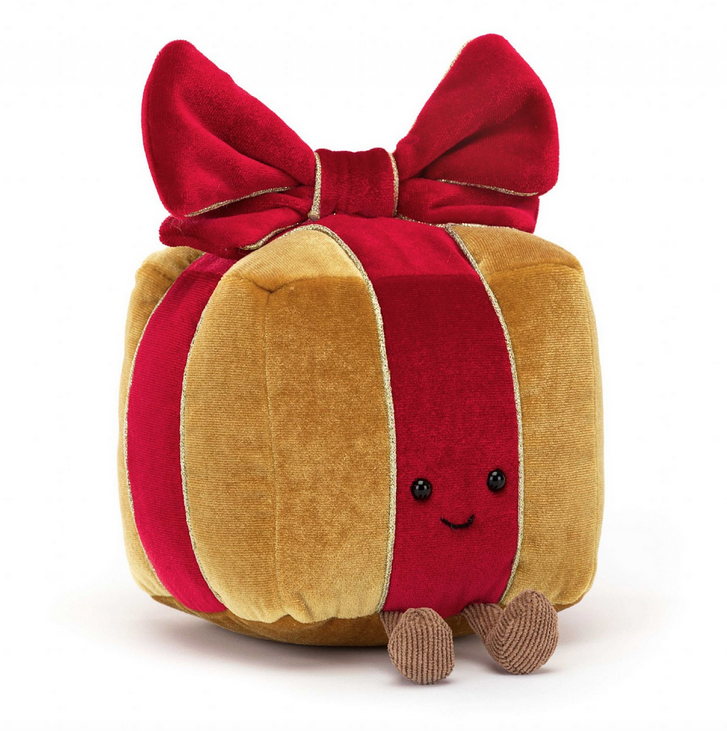 Amuseable Present is a soft golden box with cranberry ribbon edged with gold braid. With a perky ruched bow, a merry smile, a suedette base and kicking cord boots.