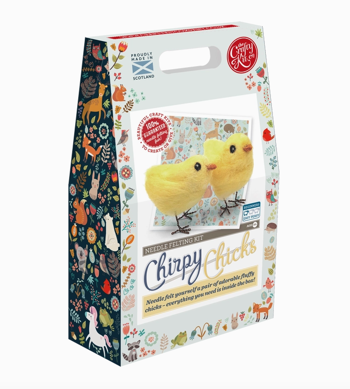 Bxox for the Chirpy Chicks Needle Felting Kit. The front of the box has a picture of the completed craft with two bright yellow felted chicks, there is a built in handle at the top of the box. 