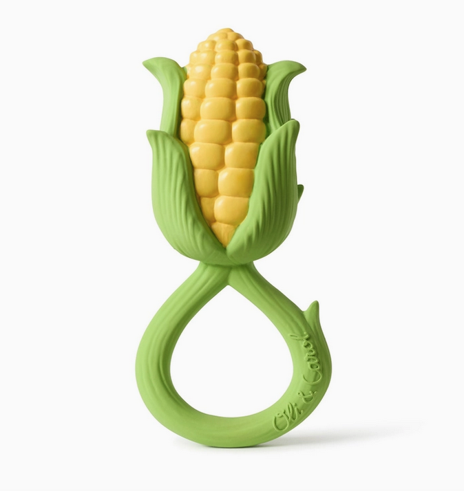 Baby rattle toy that looks like a yellow ear of corn with the green husk still attached. The handle is a green loop. 
