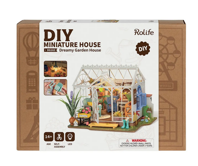 Dreamy Garden Miniature House KIt box with a picture of the completed model as well as images of other accessories. 