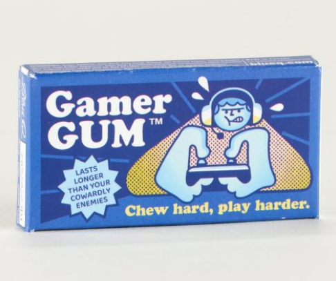 Blue box with the illustration of someone holding a game controller with a determined look on their face, reads Gamer Gum in white letters, and "Chew Hard Play Harder" in yellow letters. 