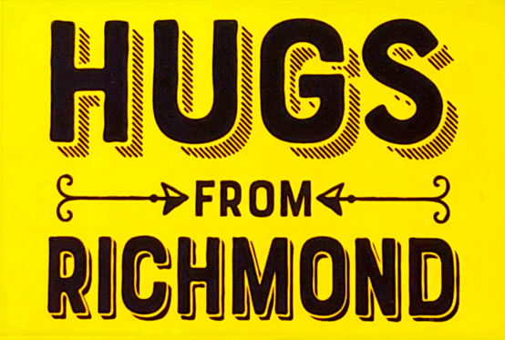 Yellow postcard that reads Hugs From Richmond in black text.