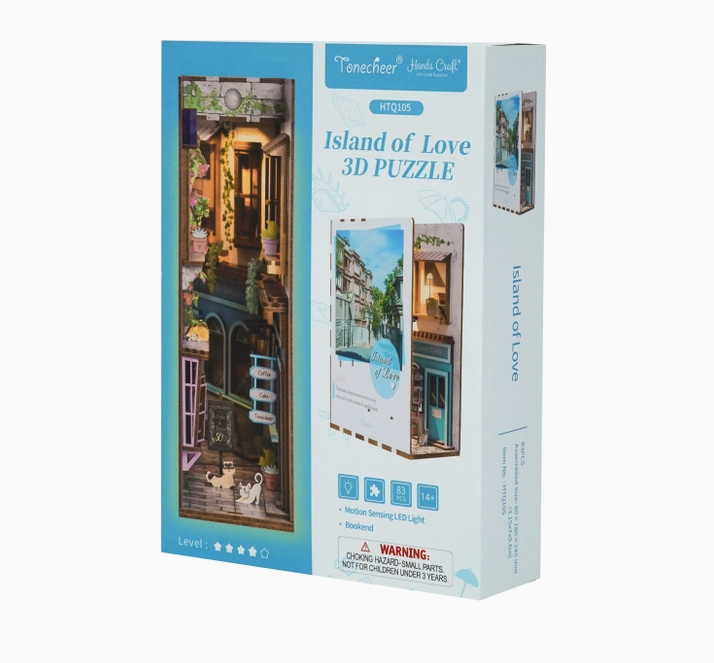 Box containing the components to build the Island of Love 3D puzzle. The front of the box has a picture of the completed model. 