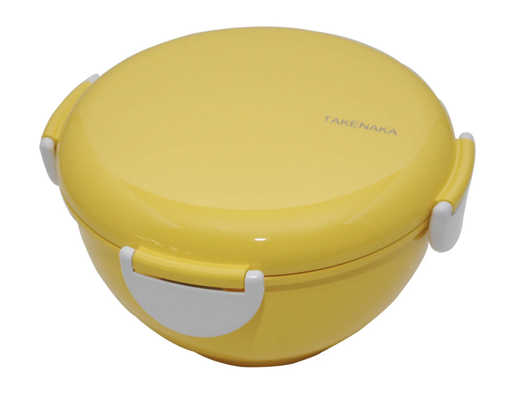 Yellow bento bowl with lid.