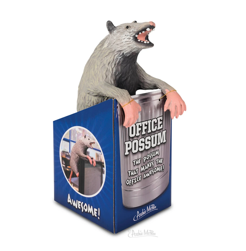 Office Possum is a gray silicone possum that can hang over the back of a computer, trash bin, and more.