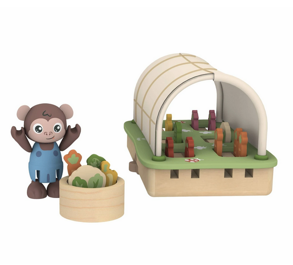 The Organic  Greenhouse playset. This includes a greenhouse, compost bin, rake, trowel, watering can, vegetable basket, four compost layers, two plots of lentils, four carrots, two cabbages and two tomatoes.