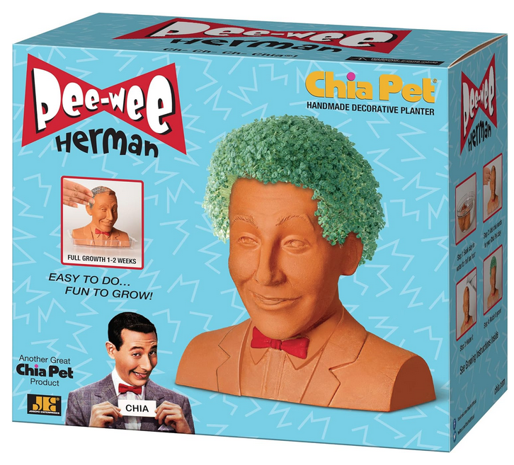 Box containing the Pee Wee Herman Chia Pet, with a photo of Pee Wee himself and a chhia pet with full growth. 