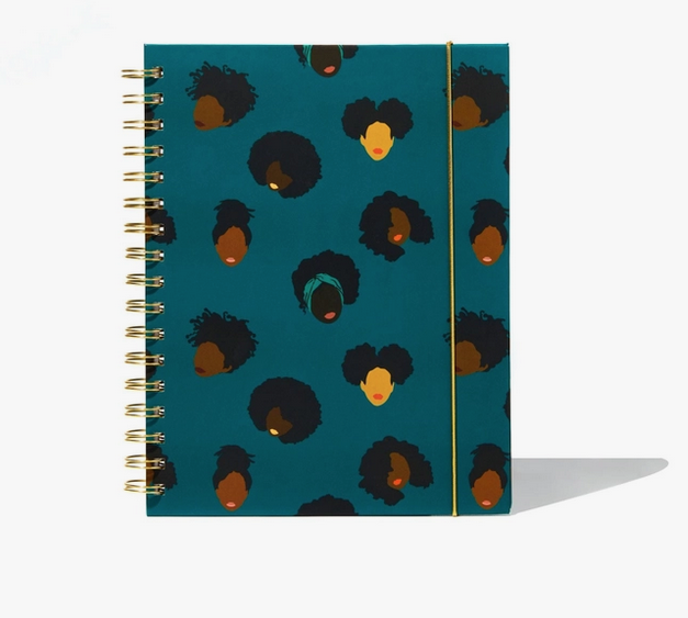 Pop of Color Planner. A spiral bound planner with a cover featuring lots of lovely black and brown women on a dark teal background. 