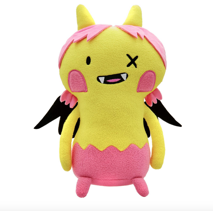 The Pxrtrait Dxll measures 14” tall and features a yellow body with pink hair and black wings