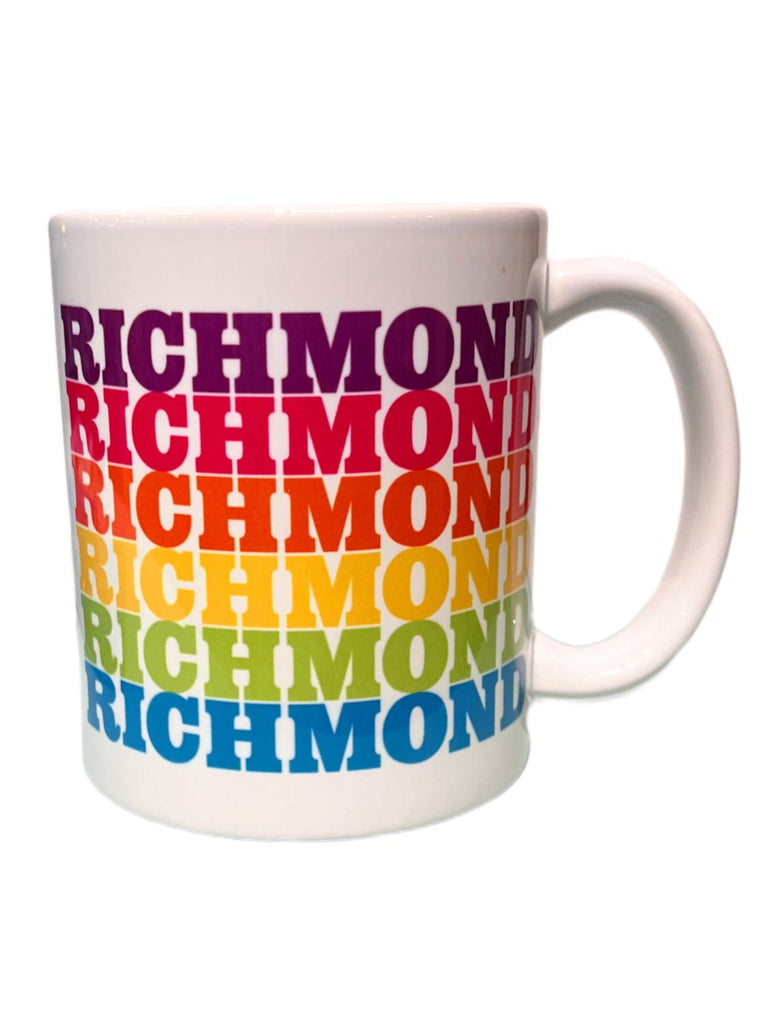 White ceramic mug with the word "Richmond" in a repeating pattern of rainbow colors.